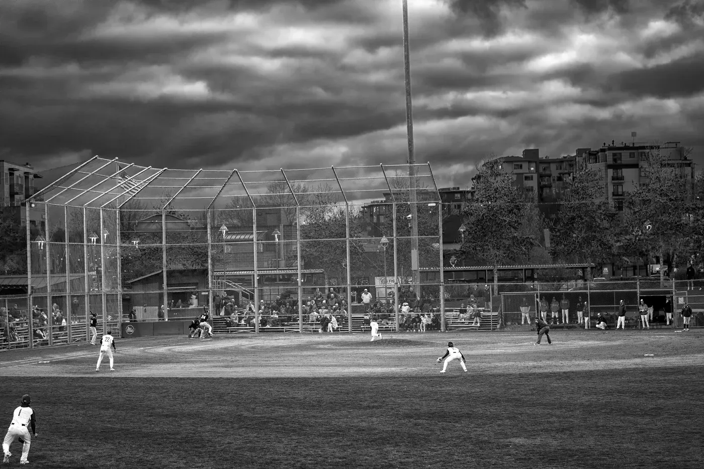 The Pitch at Lee Johnson Field: Historic Grass Diamond Under Dusk Skies